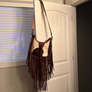 Hand carved genuine leather purse